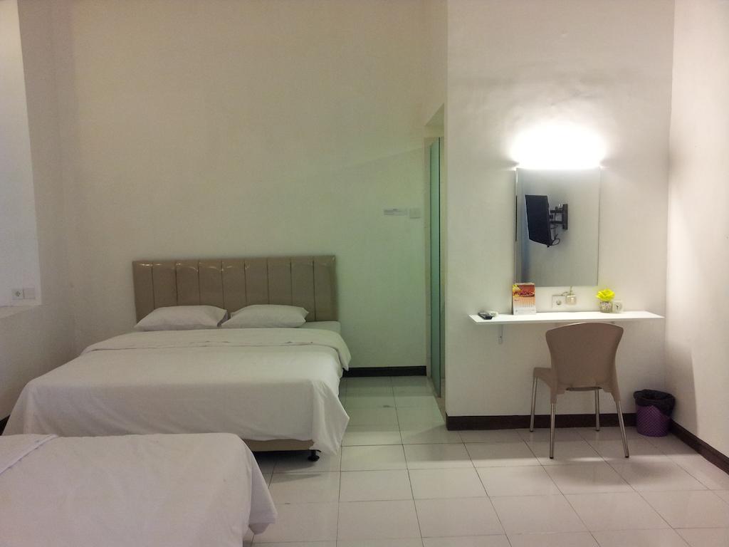 Loxy Inn Surabaya Ruang foto